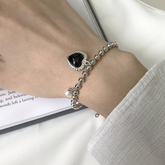 Vintage Black Heart & Pearl Sterling Silver Bracelet – A Unique Blend of Elegance and Personality